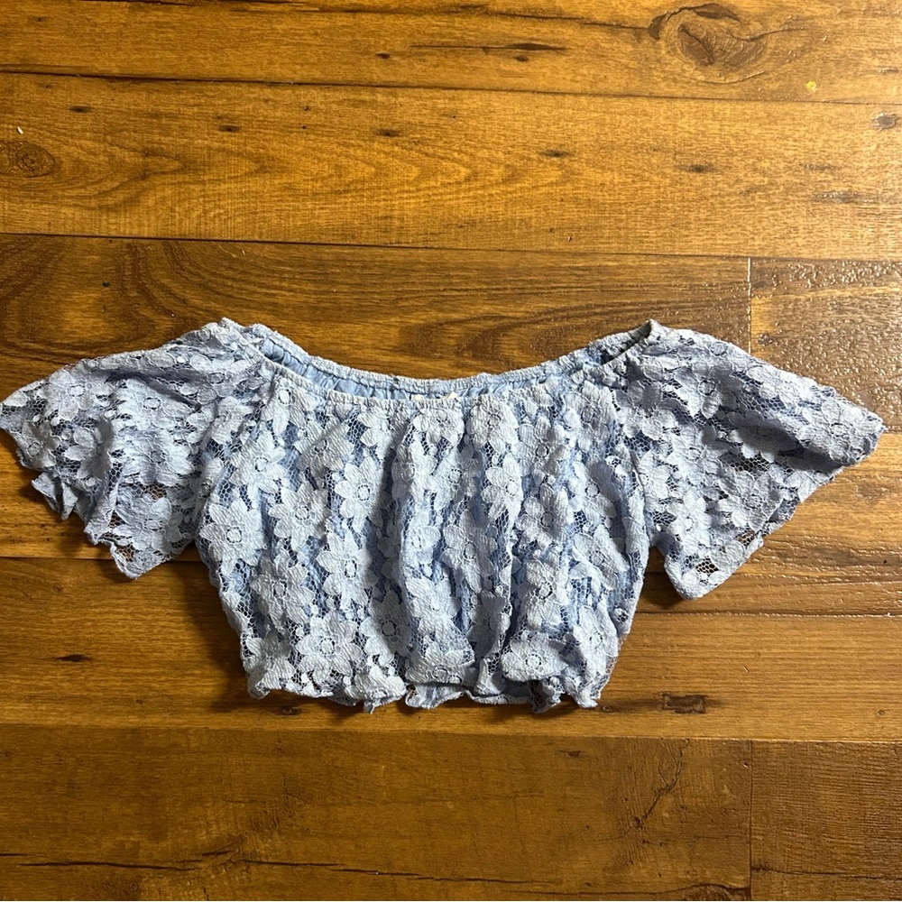 Blue lacey cropped shirt with flowy arm holes